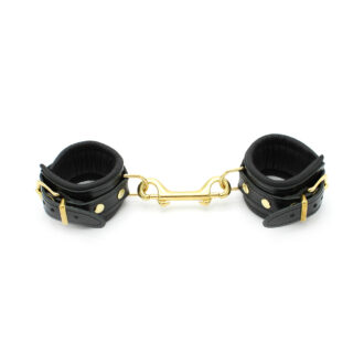 Shiny Black Leather Handcuffs koop je bij Speelgoed voor Volwassenen